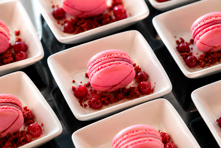 Pink macarons with raspberries on the Pinktober brunch at Vivaldi Dubai